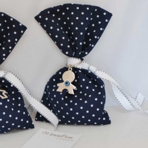 Pouch christening favor with baby boy keychainPouch christening favor with baby boy keychain